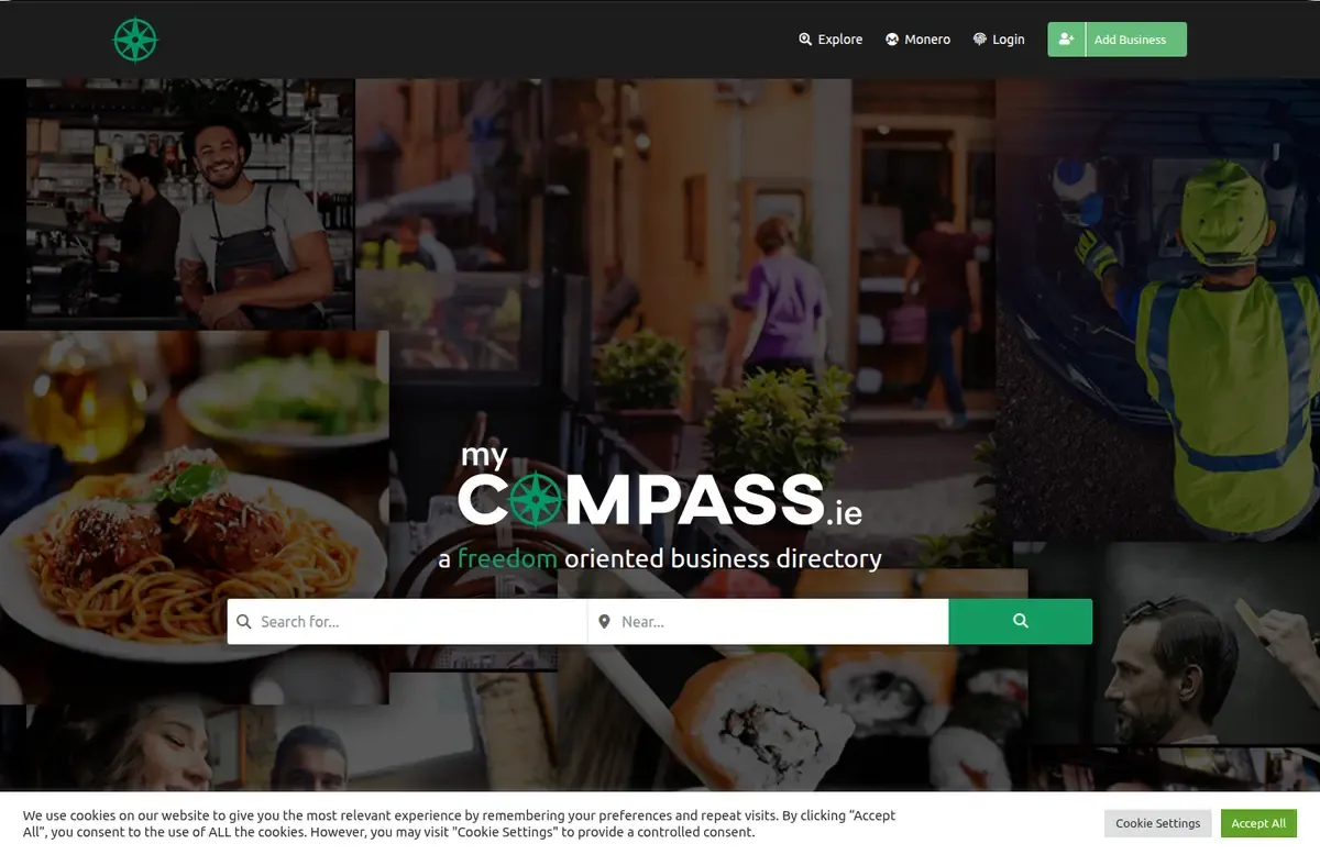 The My Compass home page as archived in 2024: the myCOMPASS.ie logo over a collage of cafés, food and tradespeople, with a search bar for what and where, and a cookie banner along the bottom.